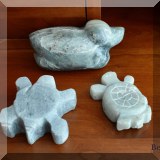 D101. Carved stone creatures.